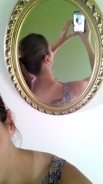 I took an inception-type selfie to show the weird running singlet tan lines I'm currently sporting. Then I went ahead and posted it here. NEW LOW.